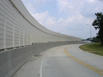 Concrete highway sound barrier